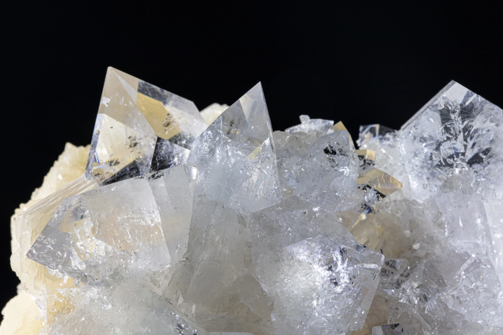 Complete specimen of cream stilbite with transparent apophyllite from India.