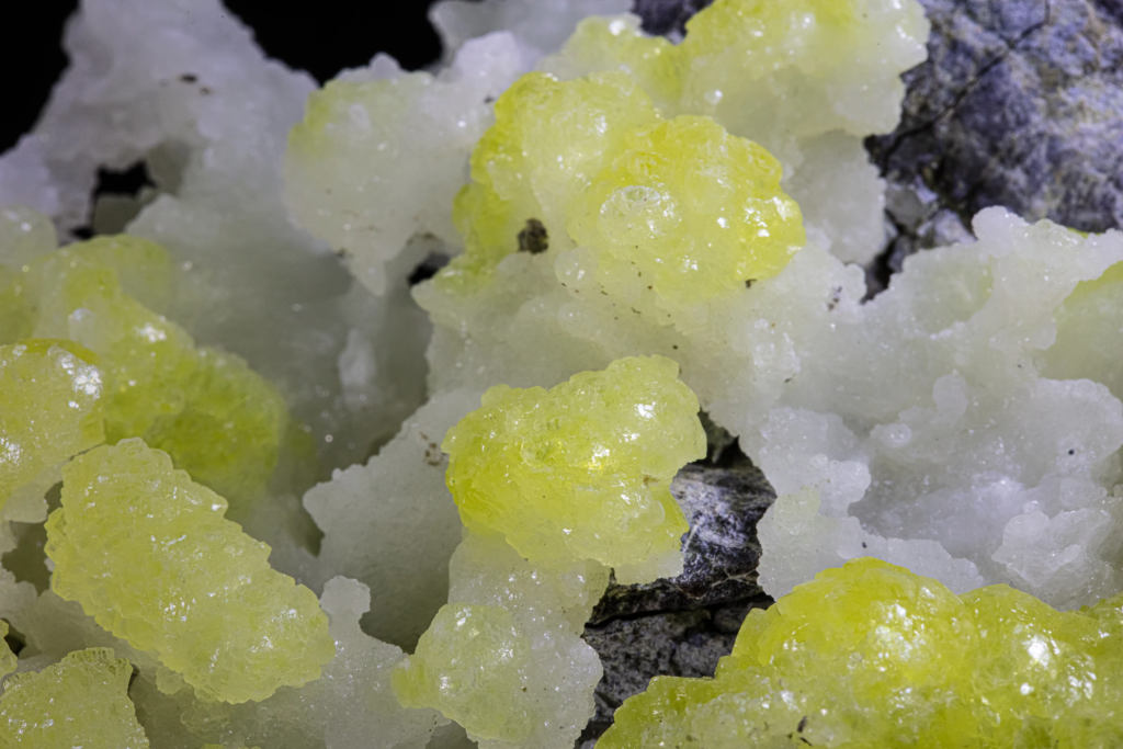 Macro of neon yellow spherical brucite aggregates from Pakistan.
