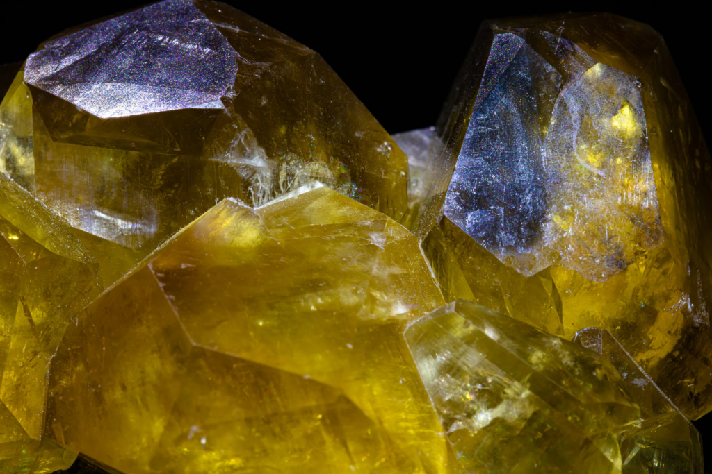 Translucent honey yellow calcite crystal terminations from China under studio light.