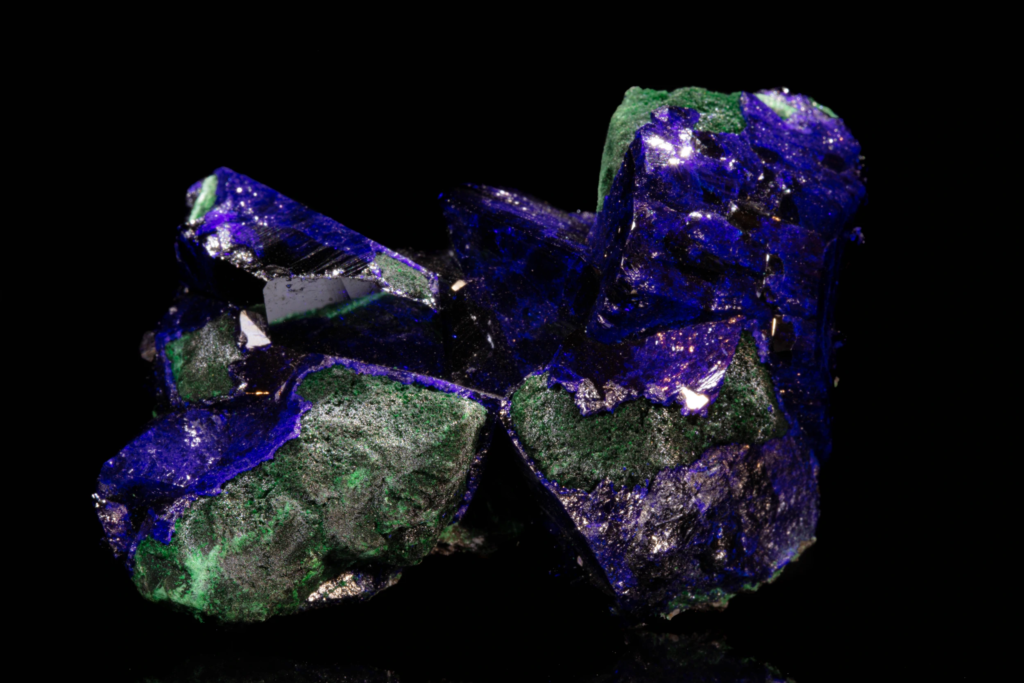 Close-up of blue azurite crystal clusters on green malachite from Mexico.