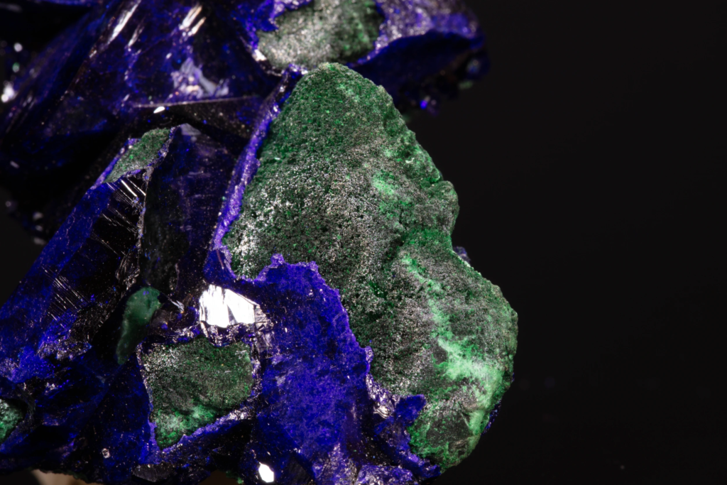 Detailed macro of fibrous green malachite spheres and blue azurite, Mexico.