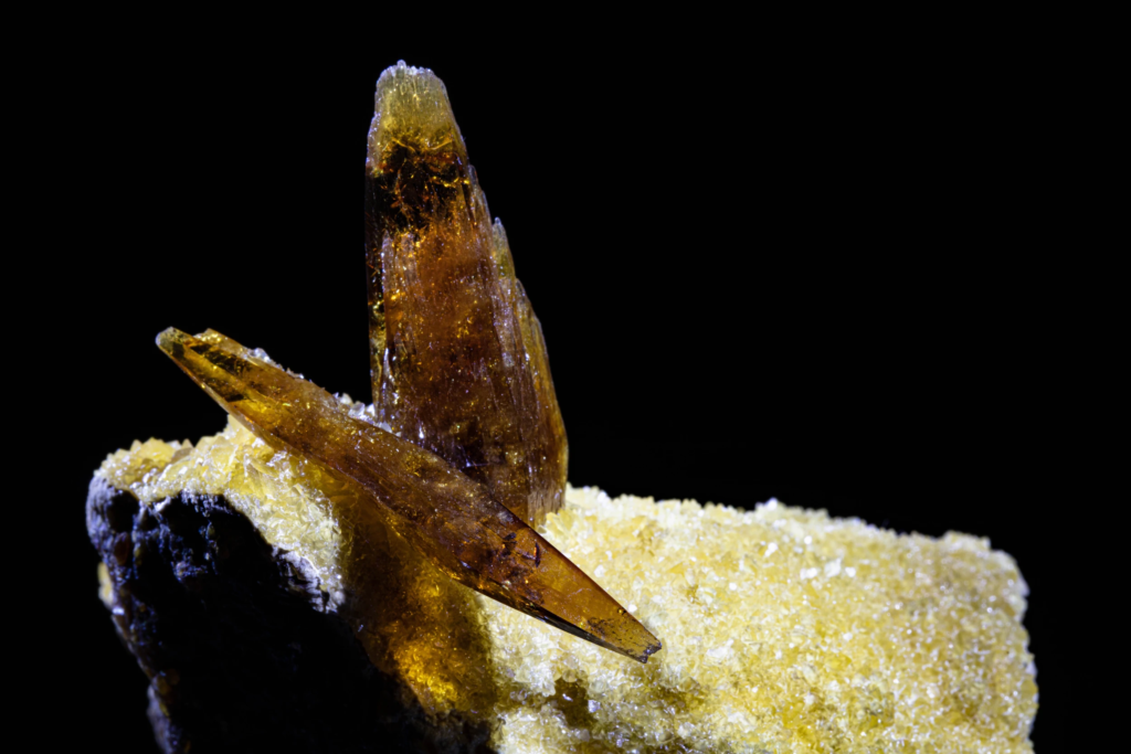 Macro photograph of translucent amber barite crystal terminations from the USA.