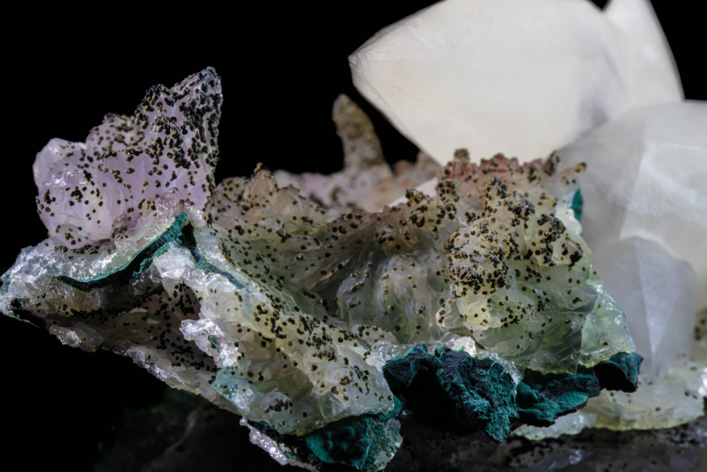 Macro view of green malachite band and mineralized druse from Brazil.