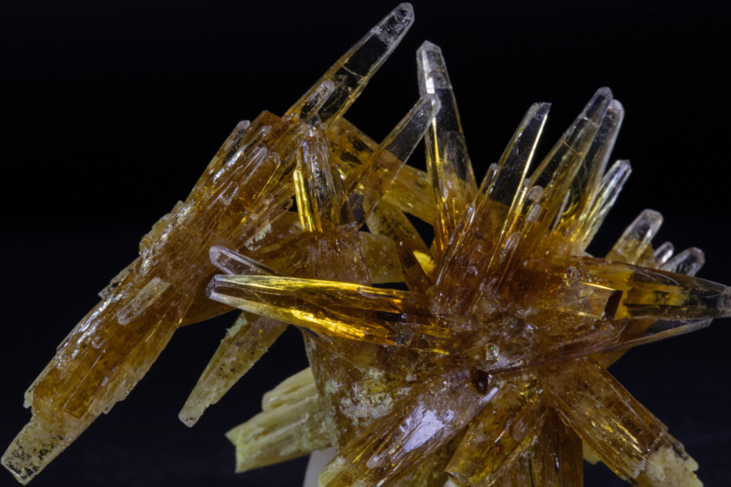Close view of interlocking honey yellow celestine prisms from Poland.