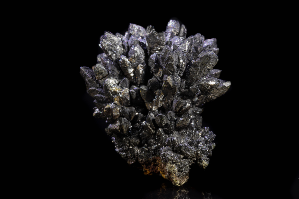 Full portrait shot of an upright black descloizite crystal cluster.