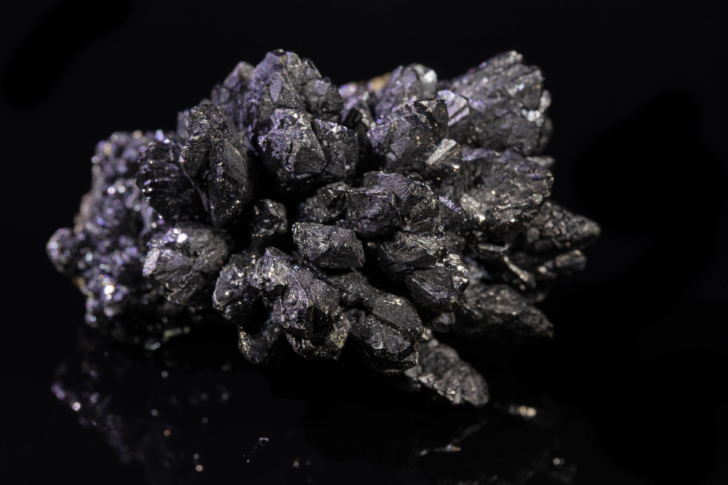 Alternative horizontal view of a dense black descloizite crystal group.