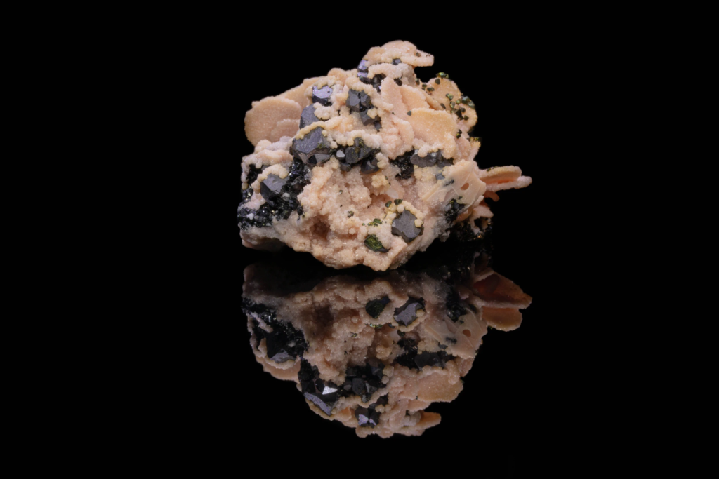 Rhodochrosite ps. Calcite on Galena