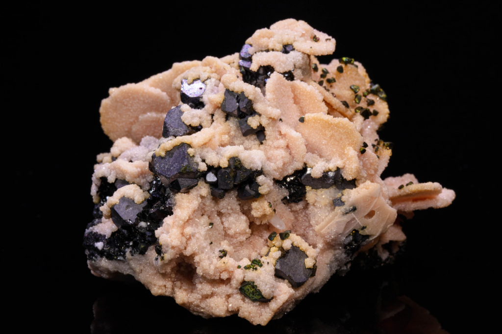 Rhodochrosite ps. Calcite on Galena