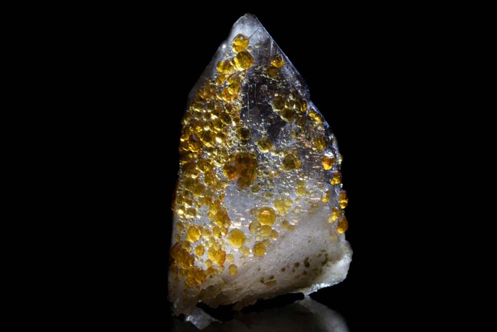Spessartine on smoky Quartz