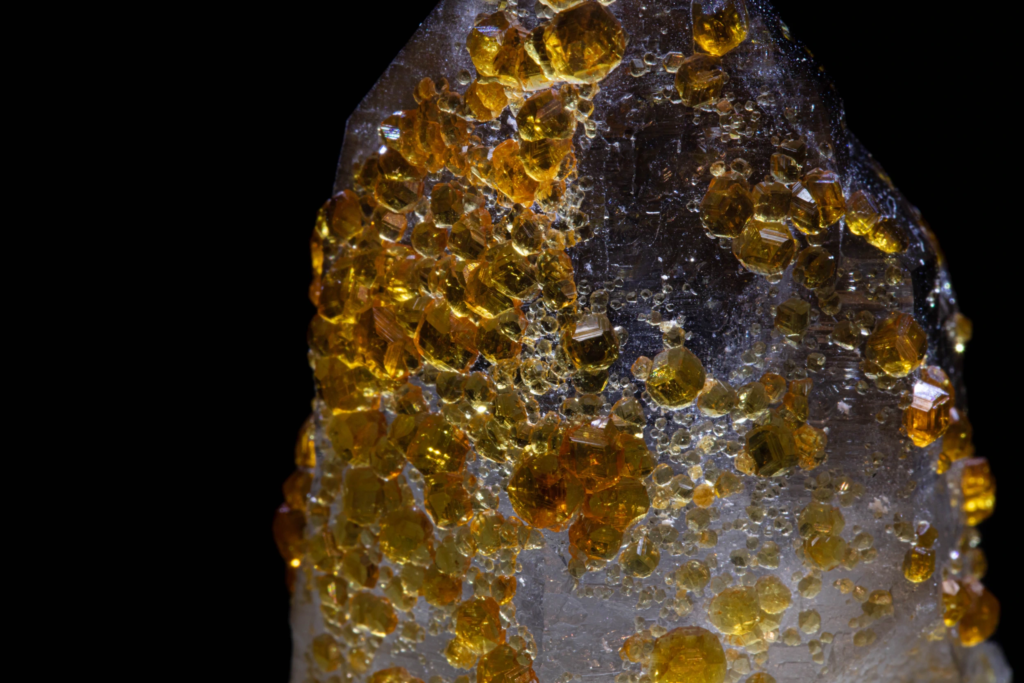 Spessartine on smoky Quartz